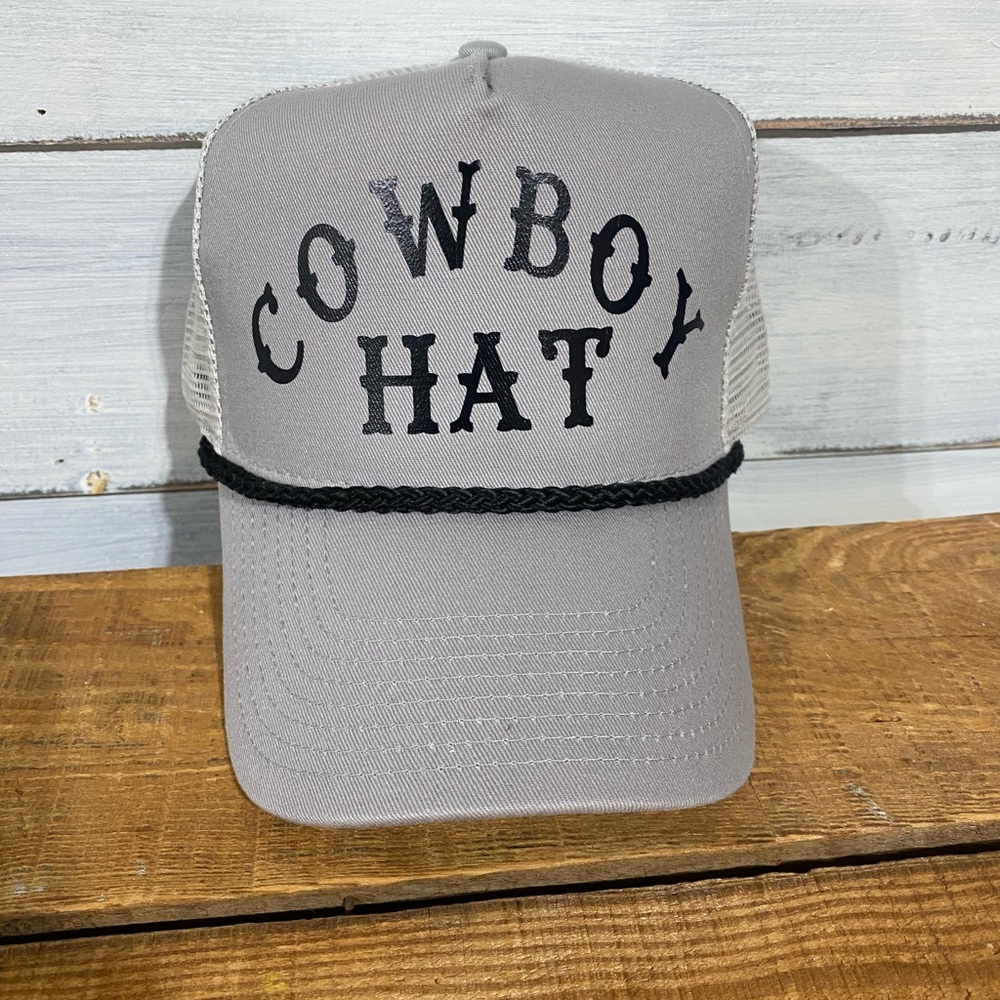 Gray twill hat with black lettering “Cowboy Hat”